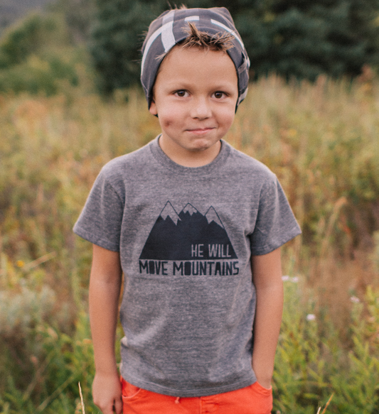 Grey shirt with mountain graphic that says He will move mountains