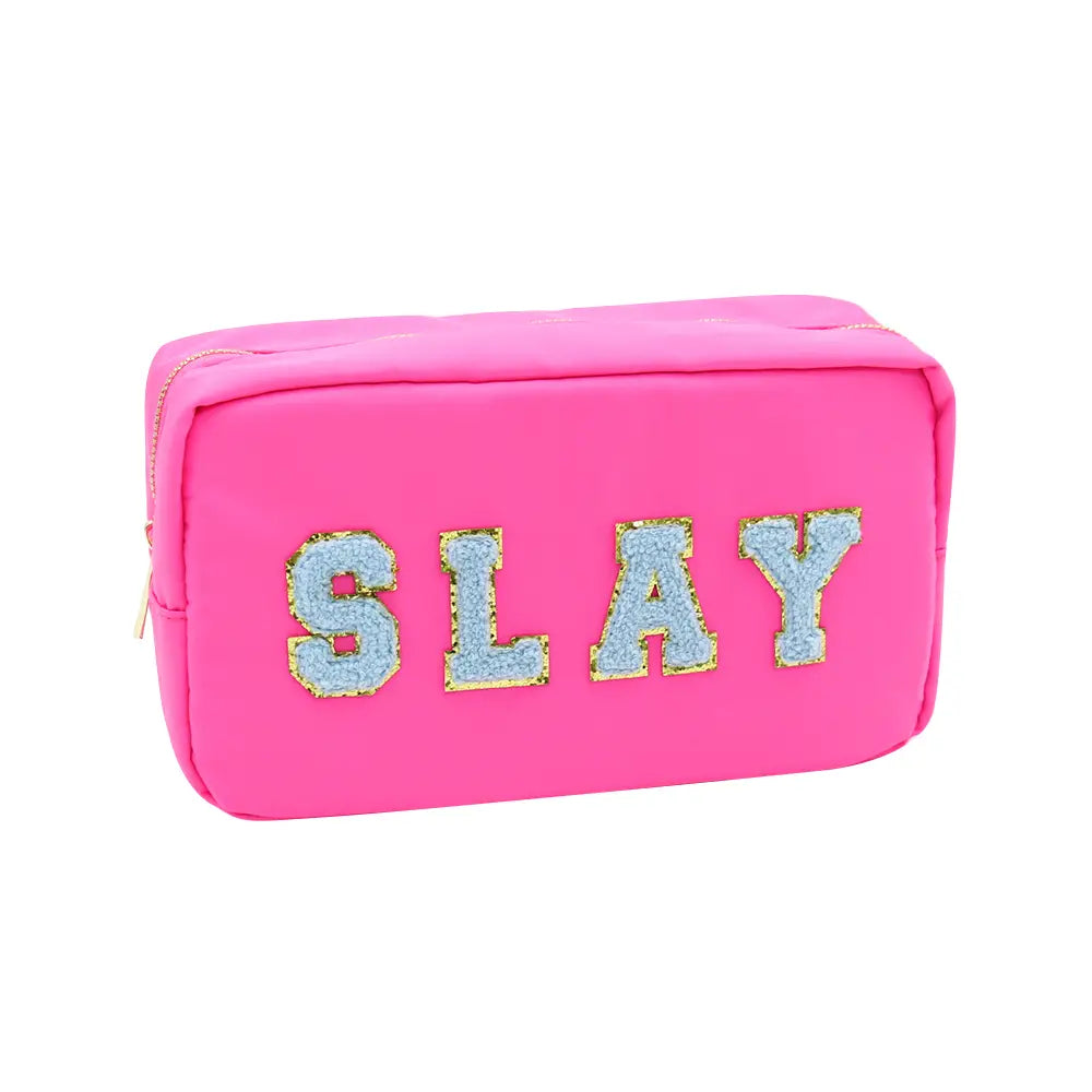 Hot pink cosmetic bag for travel with blue puff letters