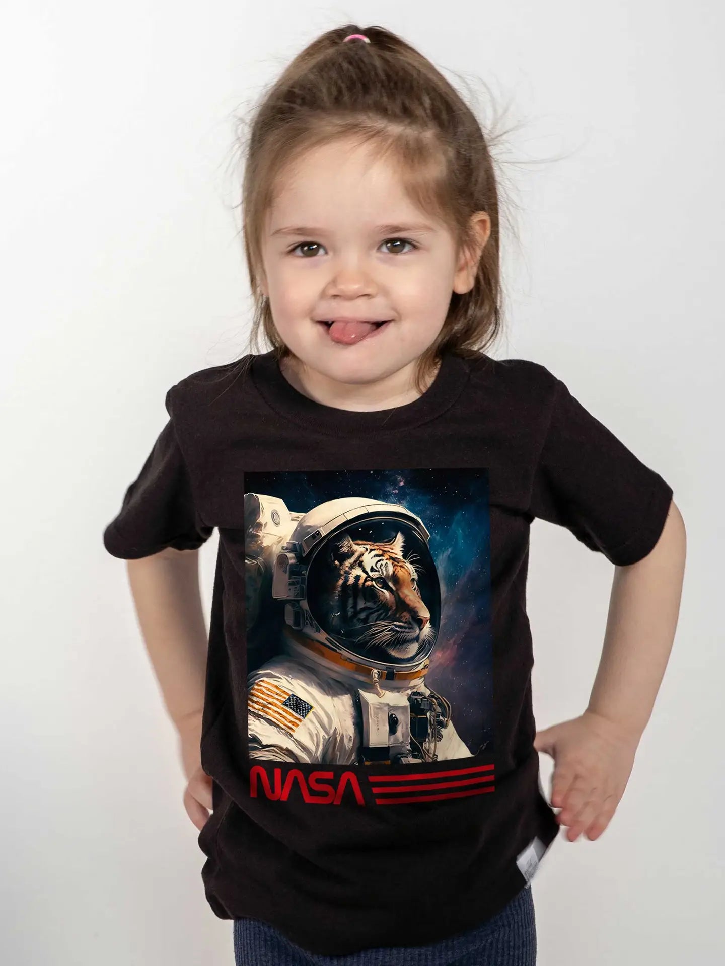 girl wearing funny t-shirt with a tiger astronaut in space