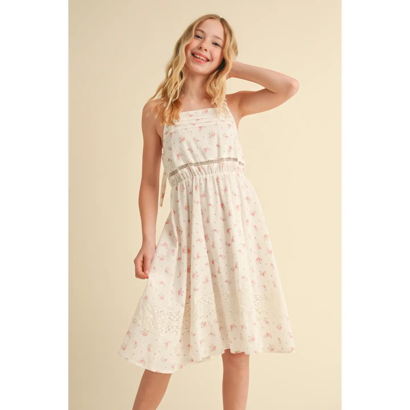 Happy teen girl wearing a sundress