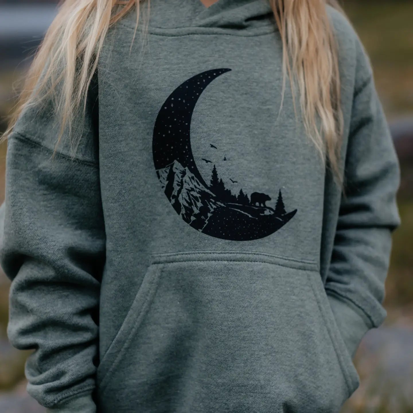 olive green hoodie with outdoor graphic