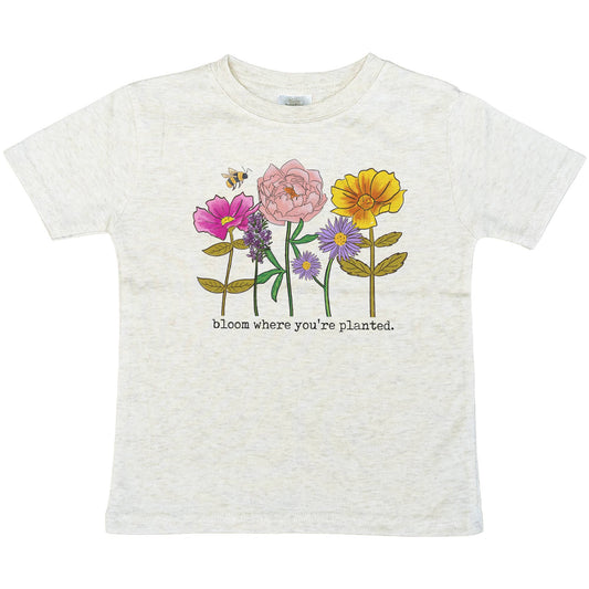 soft t-shirt with flower graphics that say bloom where you are planted