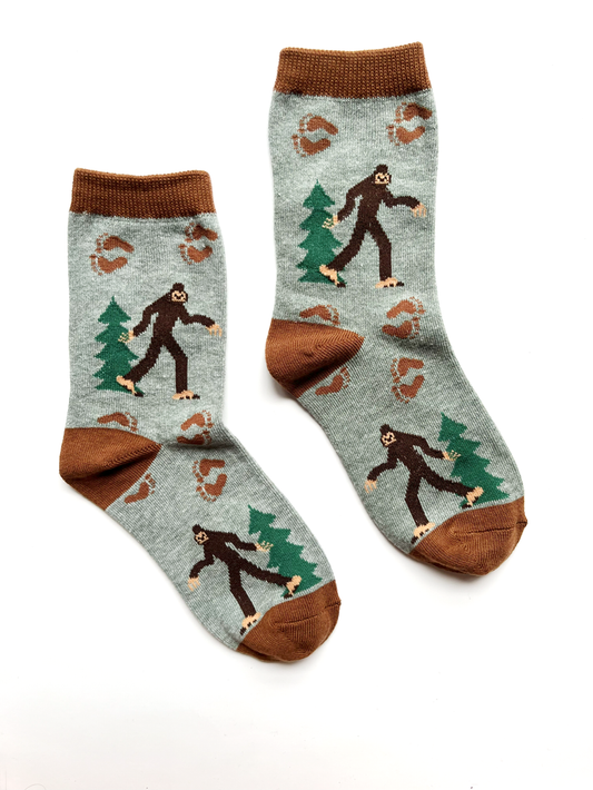 kids crew socks with trees and a bigfoot sasquatch