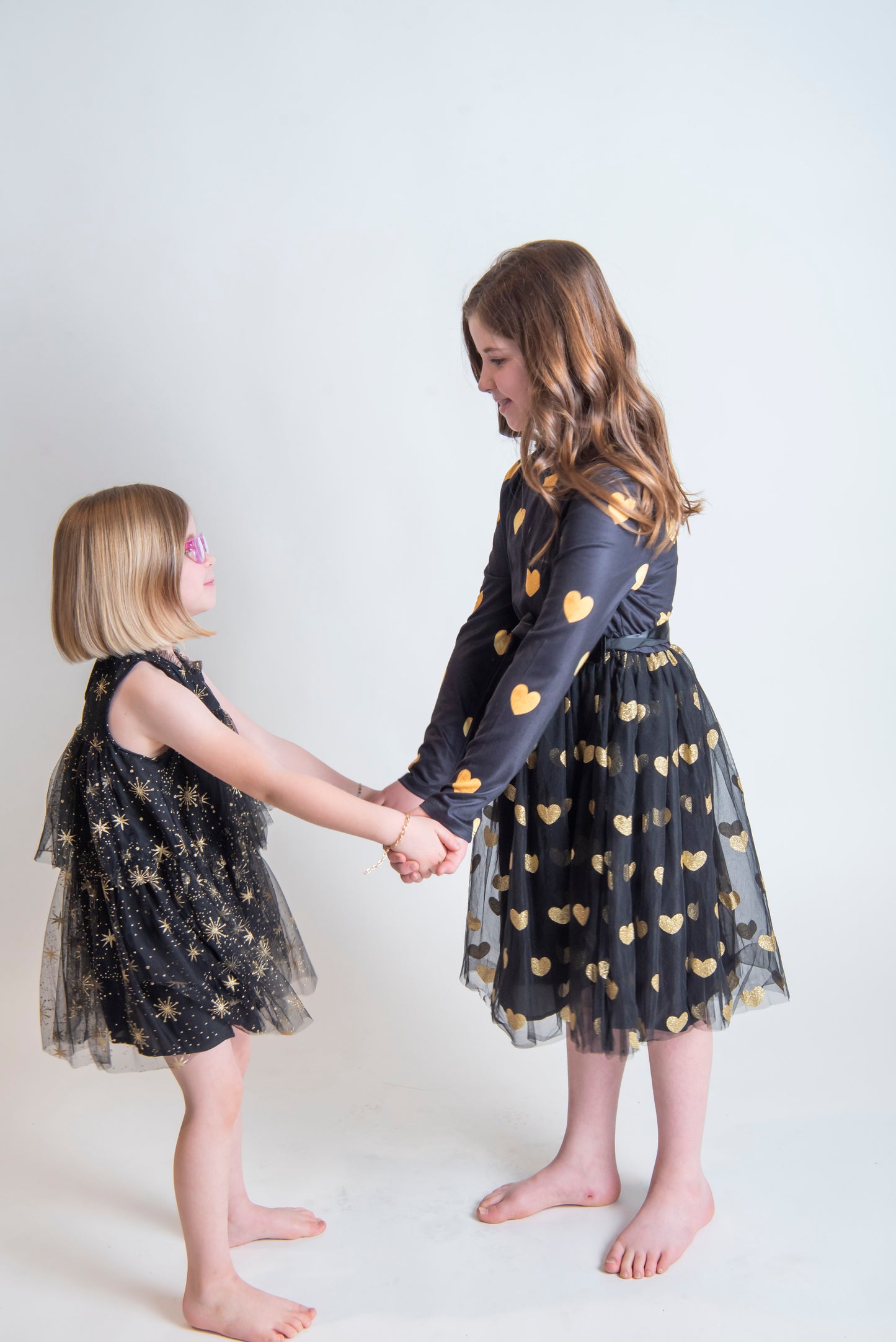 Black Long Sleeve Dress with Tulle Skirt and Gold Glitter hearts