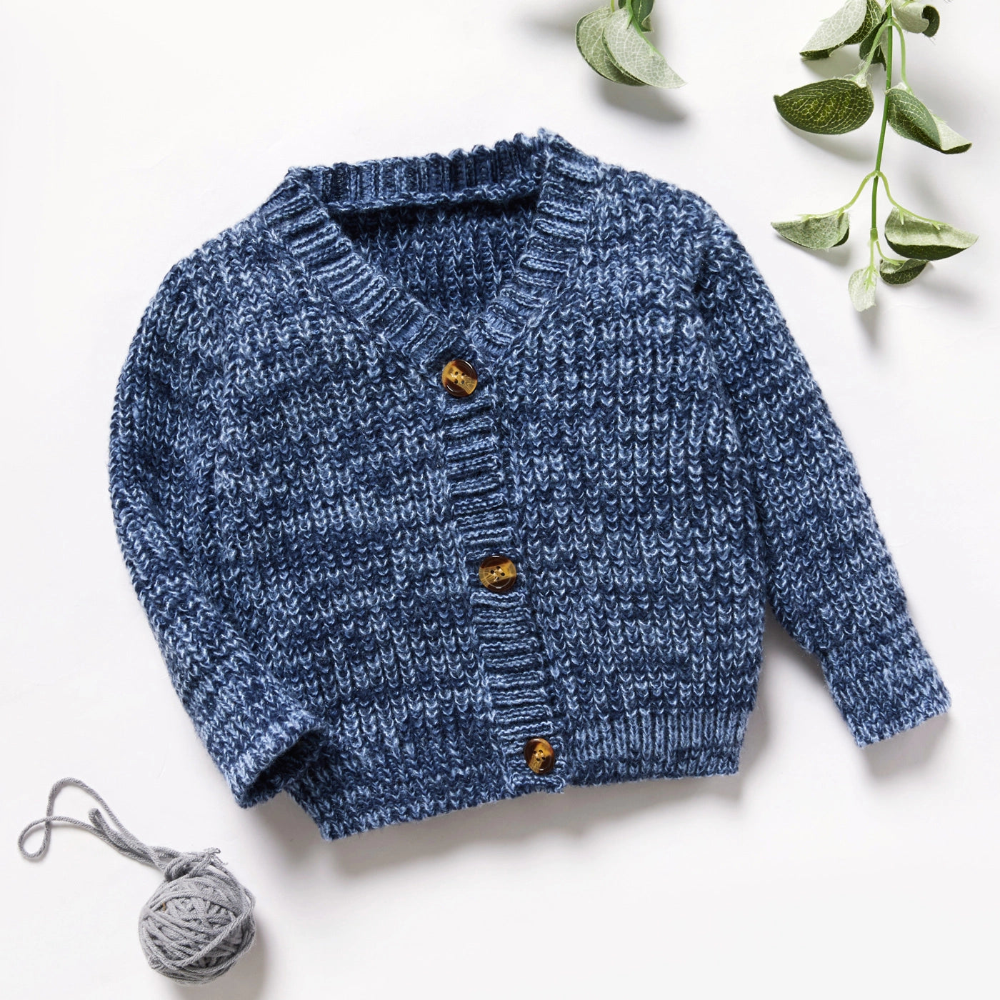 kids blue chunky knit cardigan with brown buttons