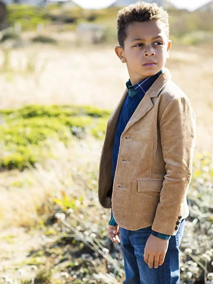 boy wearing brown corduroy blazer