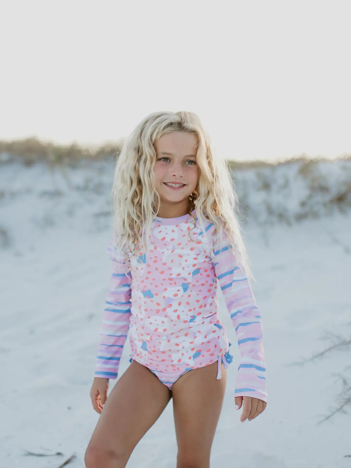 pink purple and blue long sleeve rash guard swimsuit
