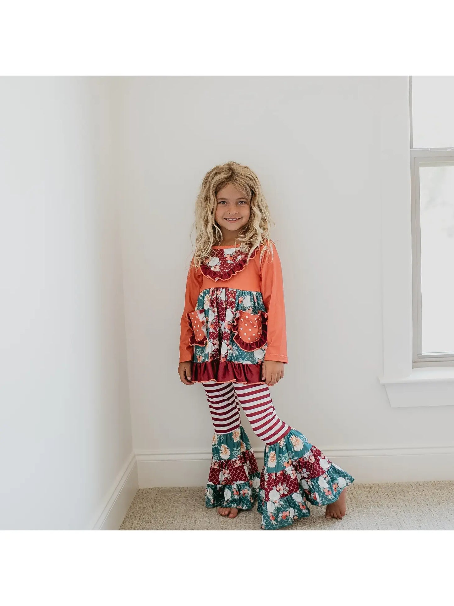 girls orange floral outfit set with long sleeve ruffle tunic and bell bottom pants