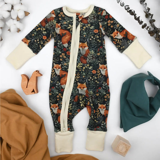 Organic cotton pajamas with foxes and flowers on it